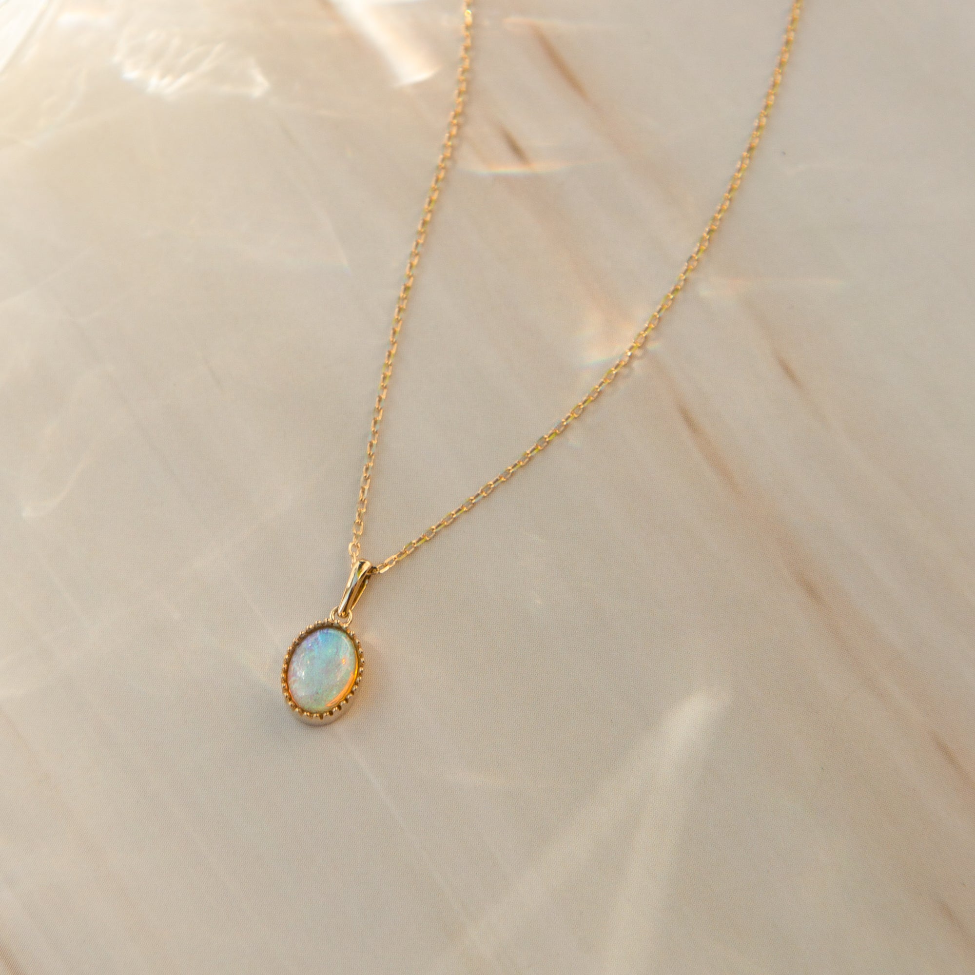 Oval Opal Charm